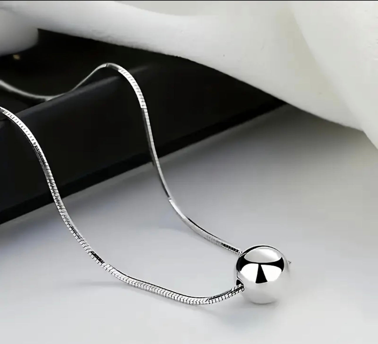 Minimalist spherical pendant