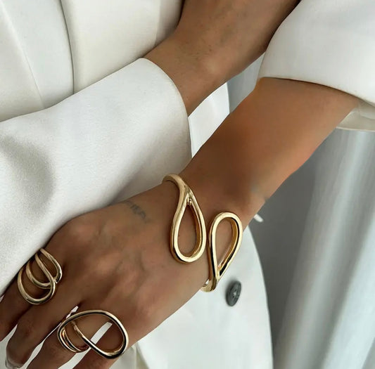 Sculptural and striking, gold-toned cuff bracelet